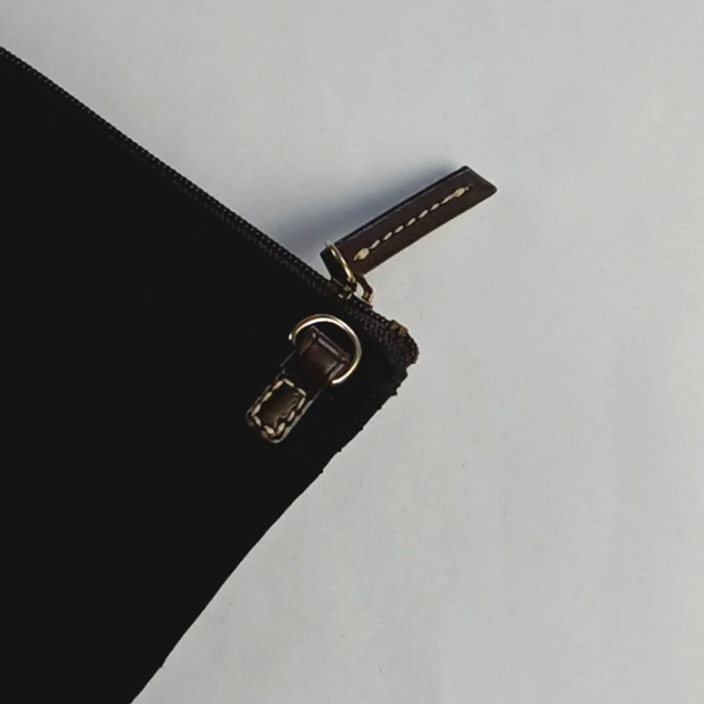 Dooney & Bourke Black and Olive Green Wristlet Clutch